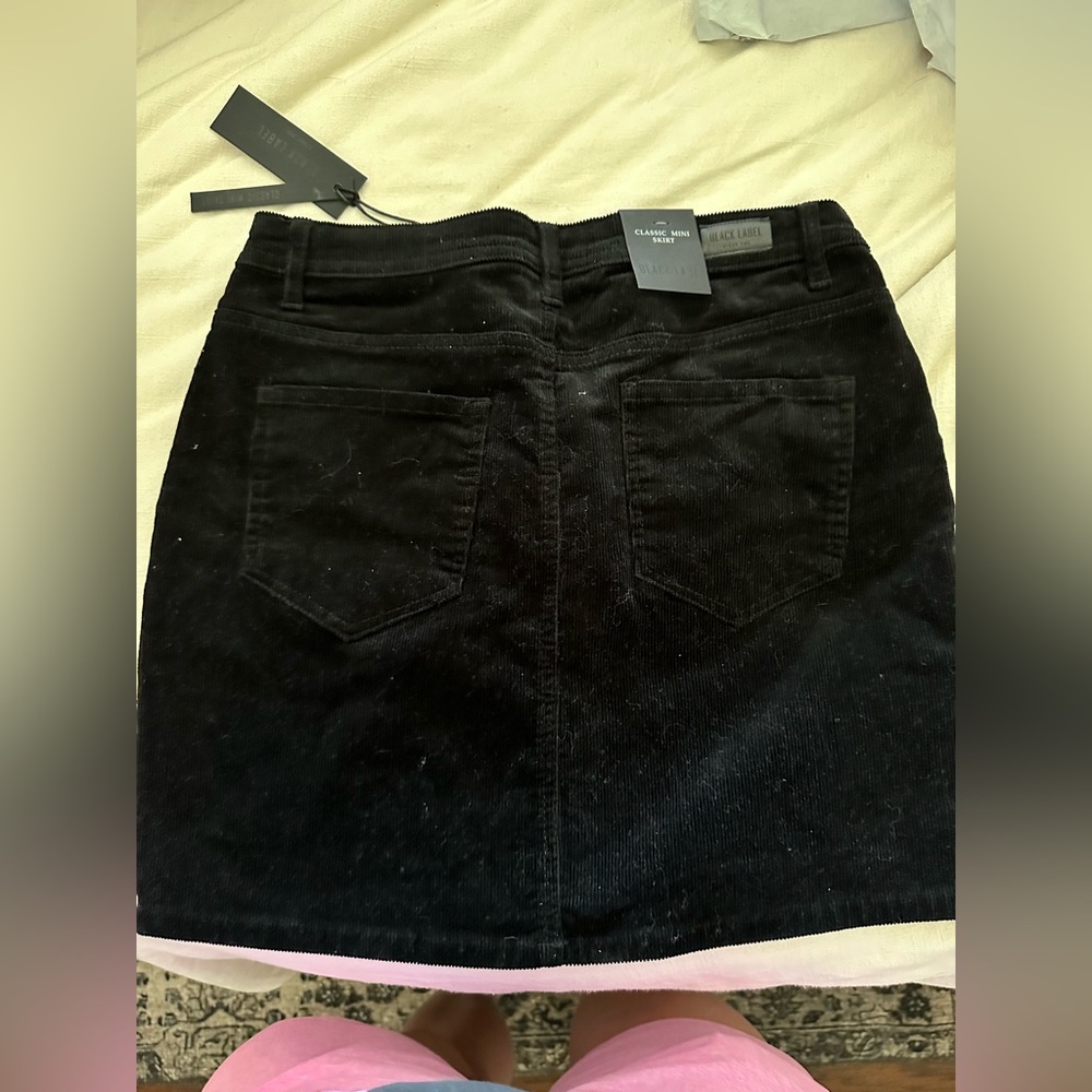 Black corduroy mini skirt